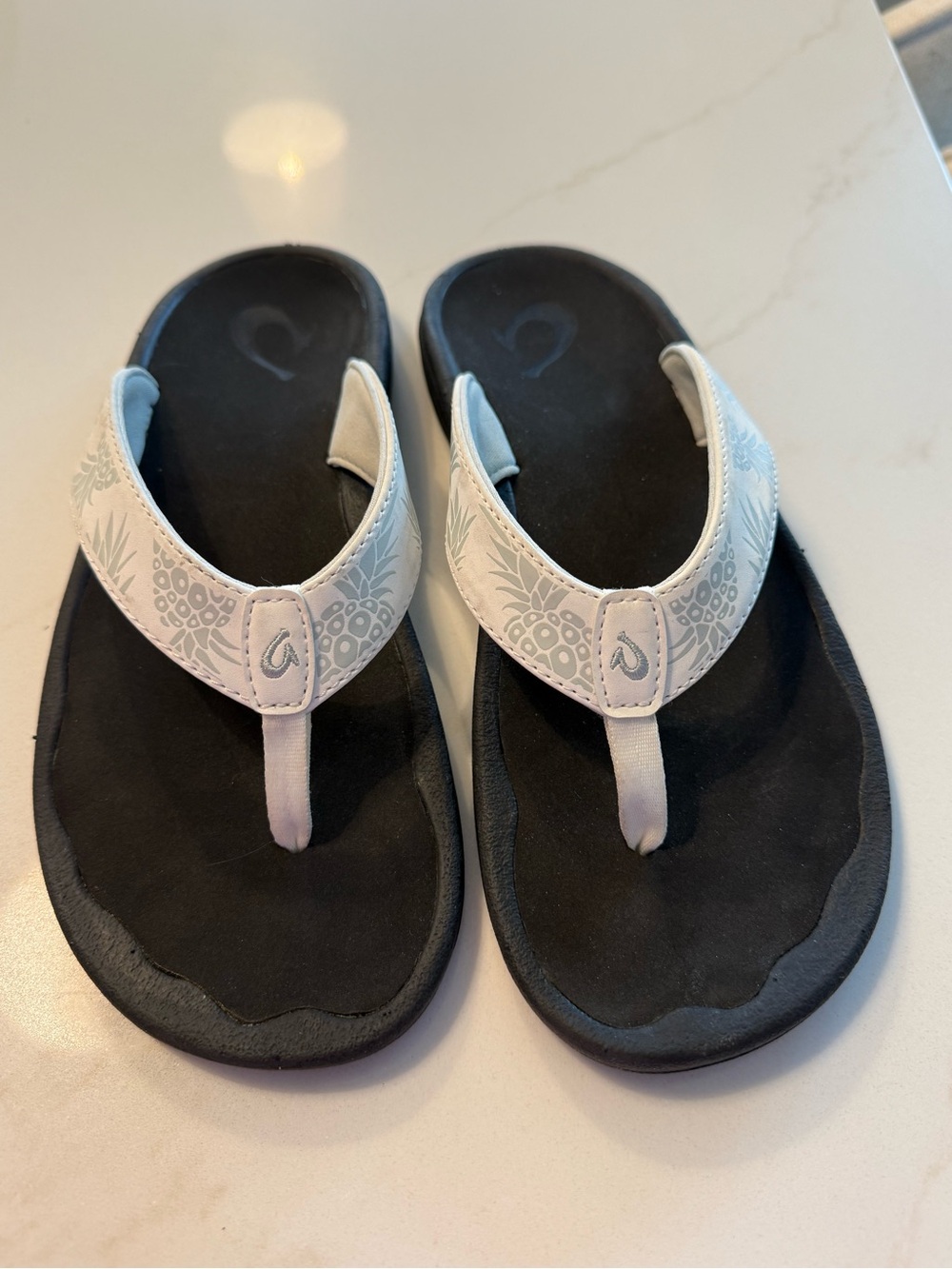 Womenโs Olukai Comfort Flip Flops